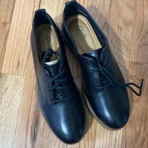 Clark’s Raisie Bloom black Oxford shoes, brand new in box.